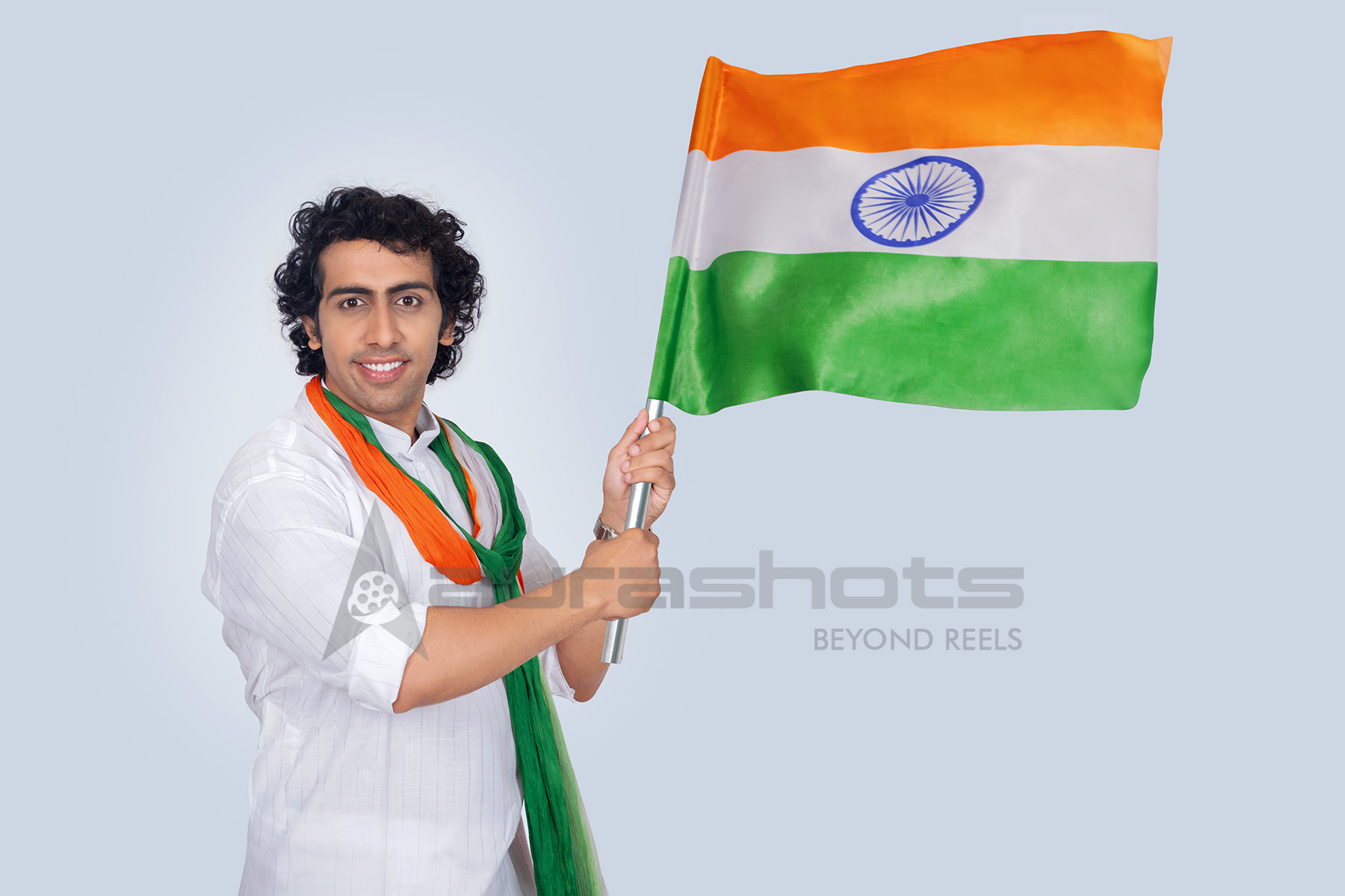 Man holding indian flag proudly