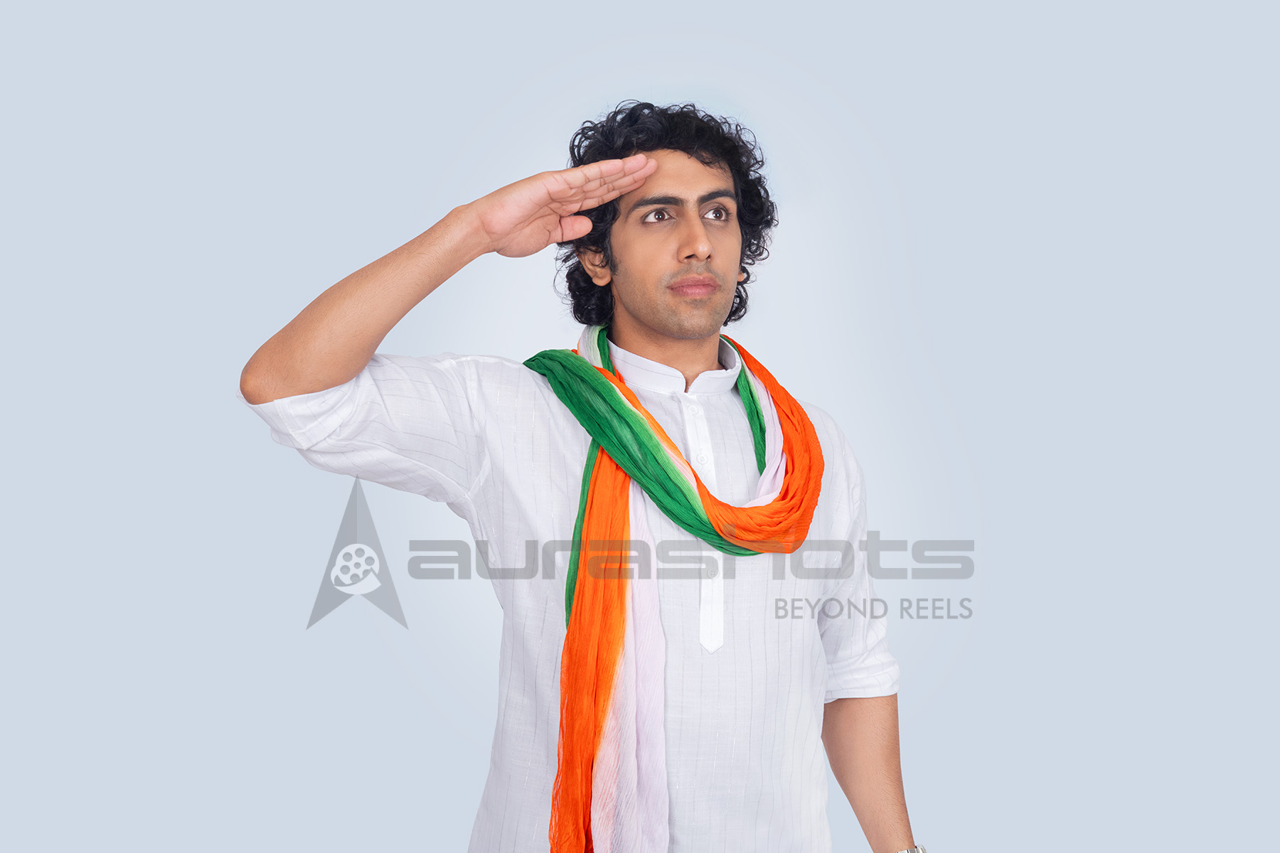 Indian man saluting the national flag