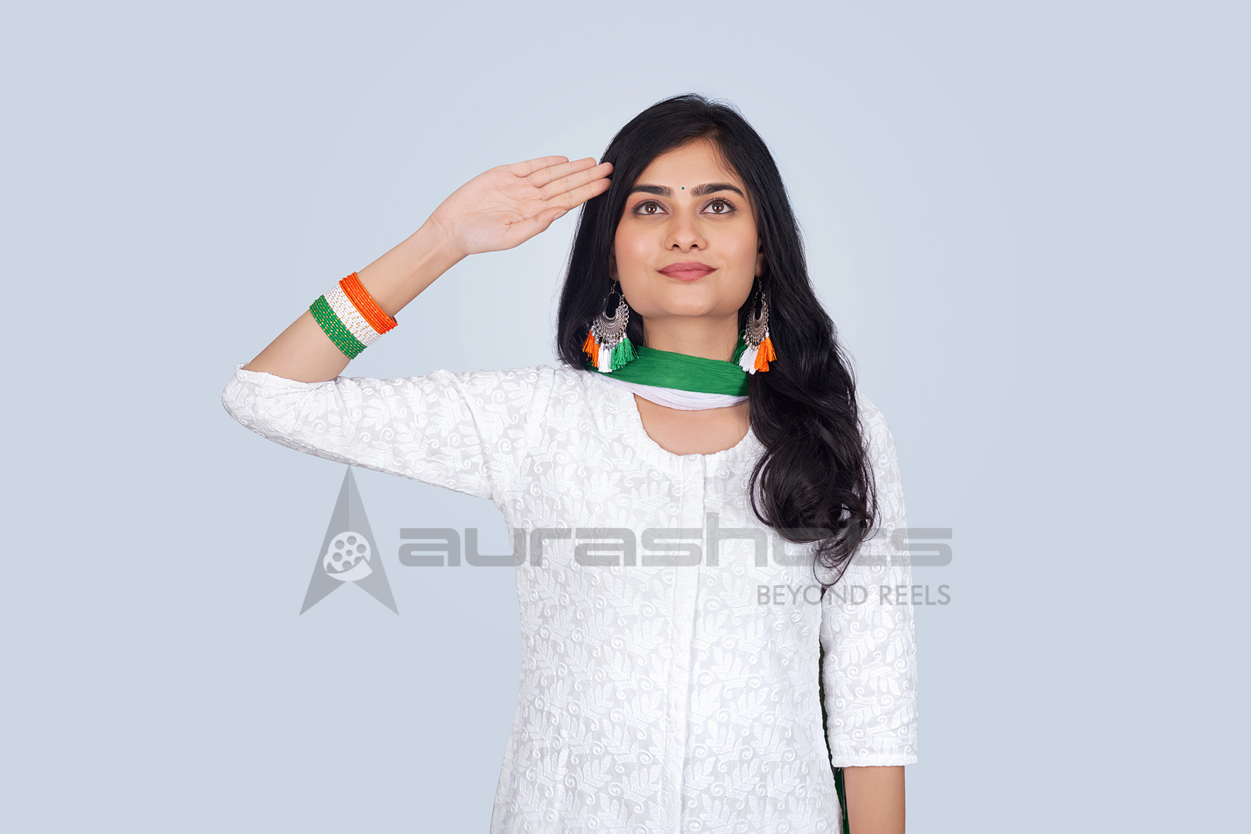 Indian woman saluting proudly