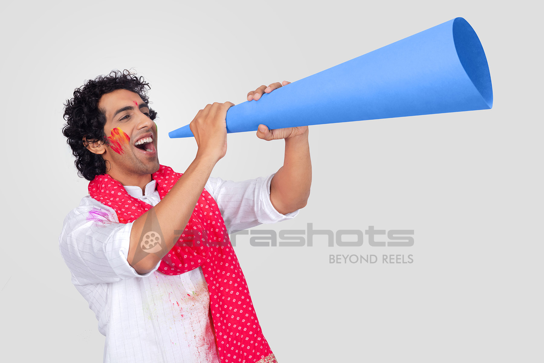Indian man announcing festive offers with megaphone
