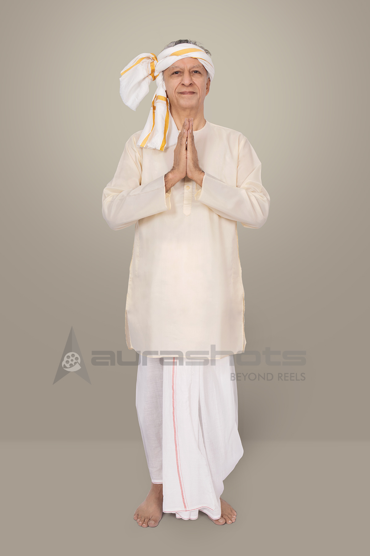Elderly rural man greeting with folded hands
