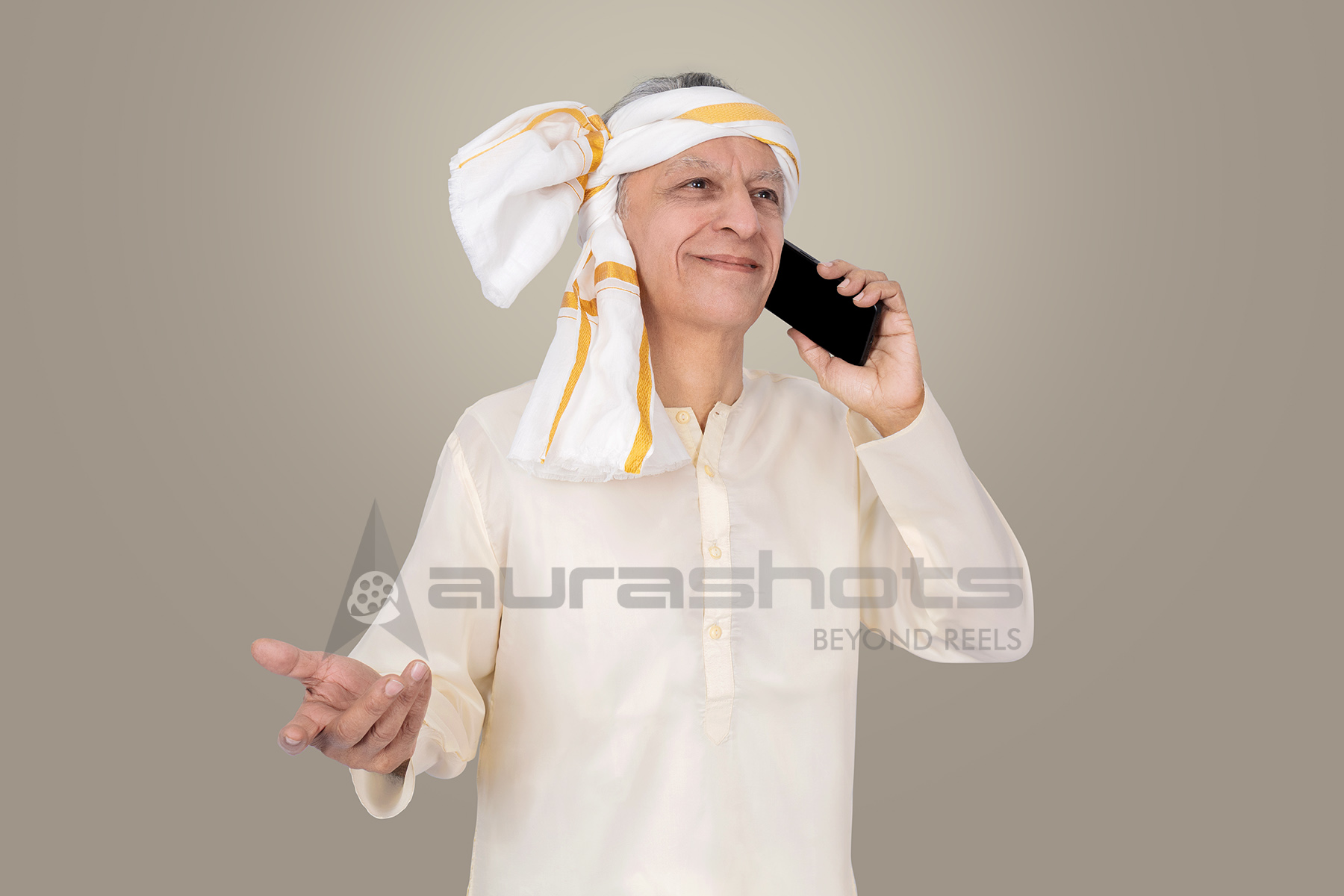 Elderly rural man talking on mobile phone