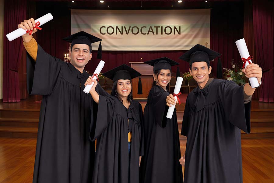 Indian graduates celebrating convocation ceremony with certificates