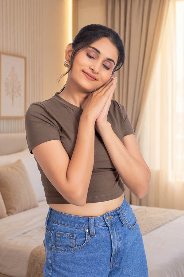 Young Indian woman demonstrating peaceful sleep and relaxation