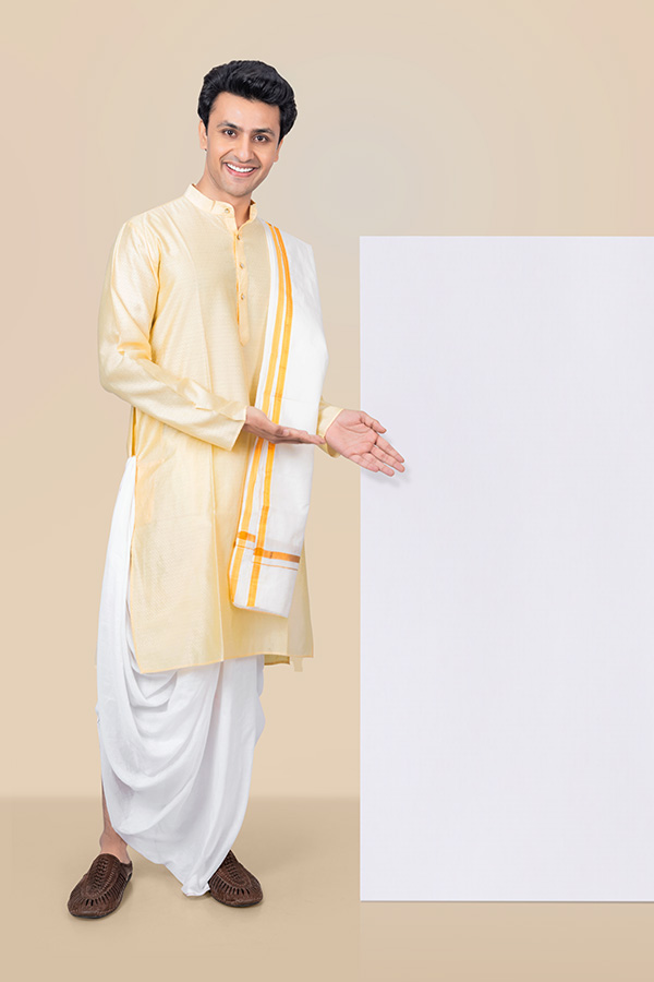 Indian man presenting blank signboard in traditional attire for Durga Puja campaign
