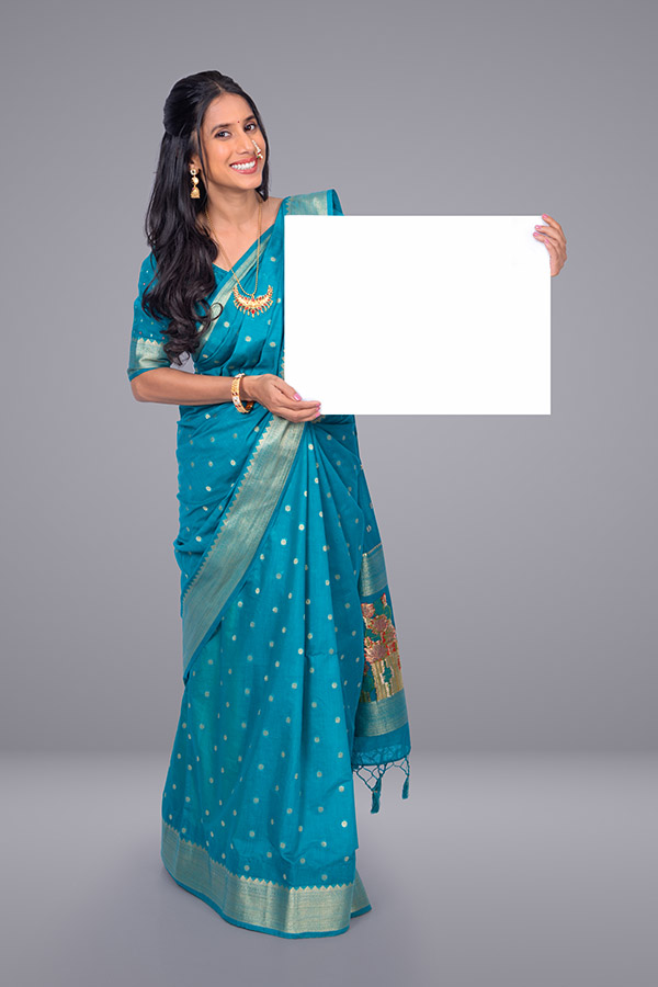 Indian woman holding blank board for promotional communication
