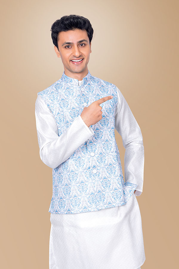 Young Indian man pointing for festive advertising campaign