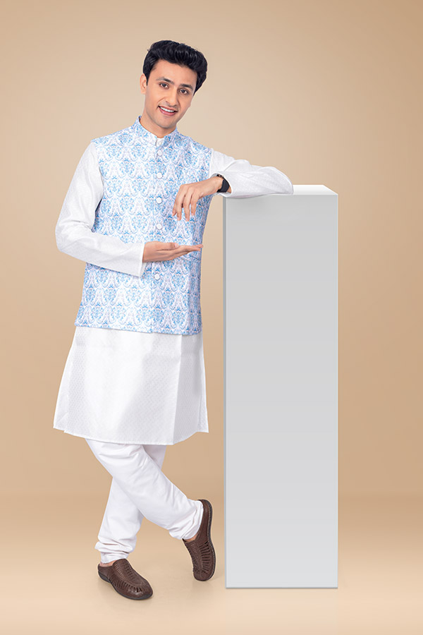 Indian man presenting blank promotional display board in ethnic attire