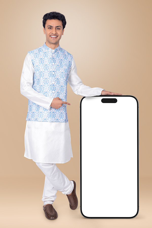 Indian man pointing towards blank smartphone screen for festive promotion