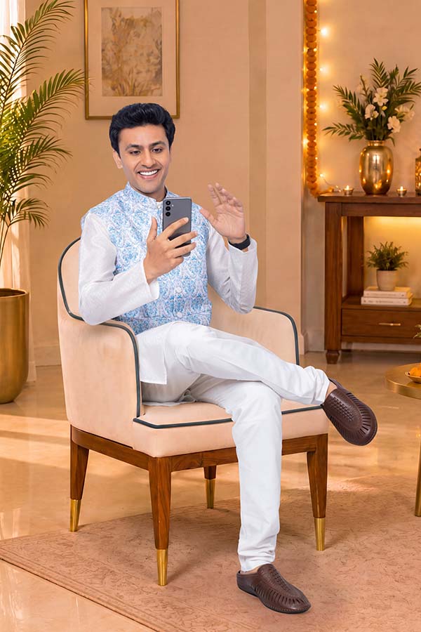 Young Indian man on video call during Diwali at home