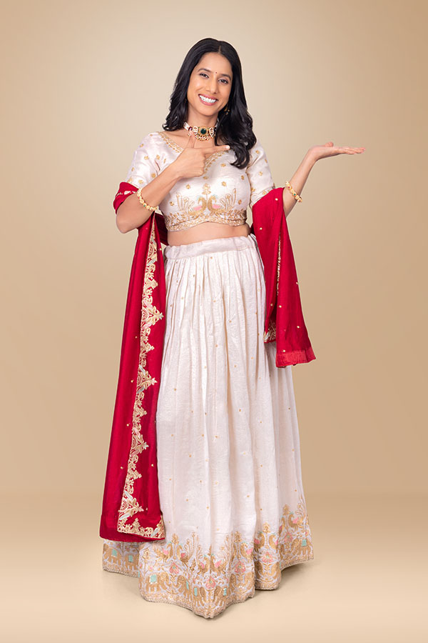 Indian woman presenting empty copy space with open palm