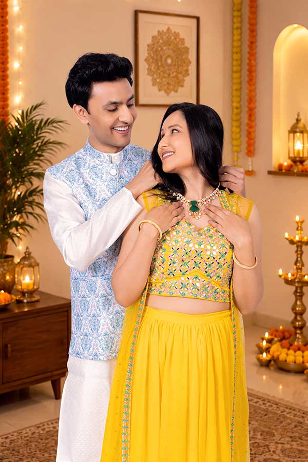 Indian husband gifting festive necklace to wife during Diwali celebration