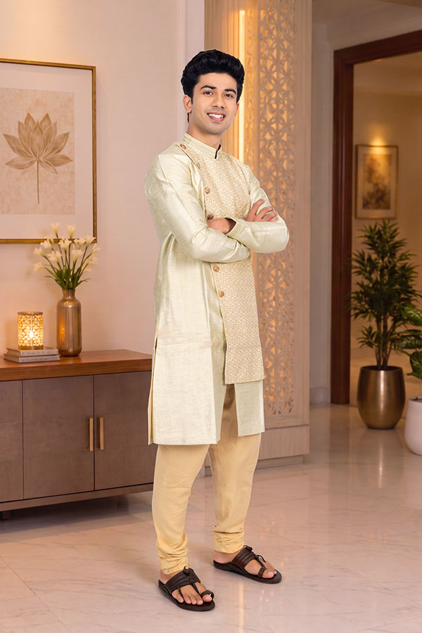 Stylish Indian man standing confidently in festive ethnic wear