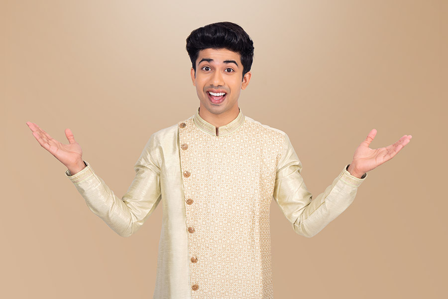 Excited Indian man with open arms expressing festive happiness