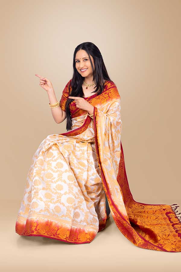 Indian woman in traditional saree posing for Diwali celebration