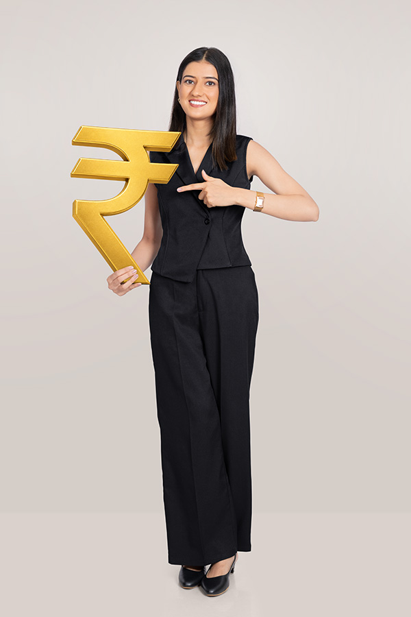 Indian businesswoman presenting golden rupee symbol for financial concept