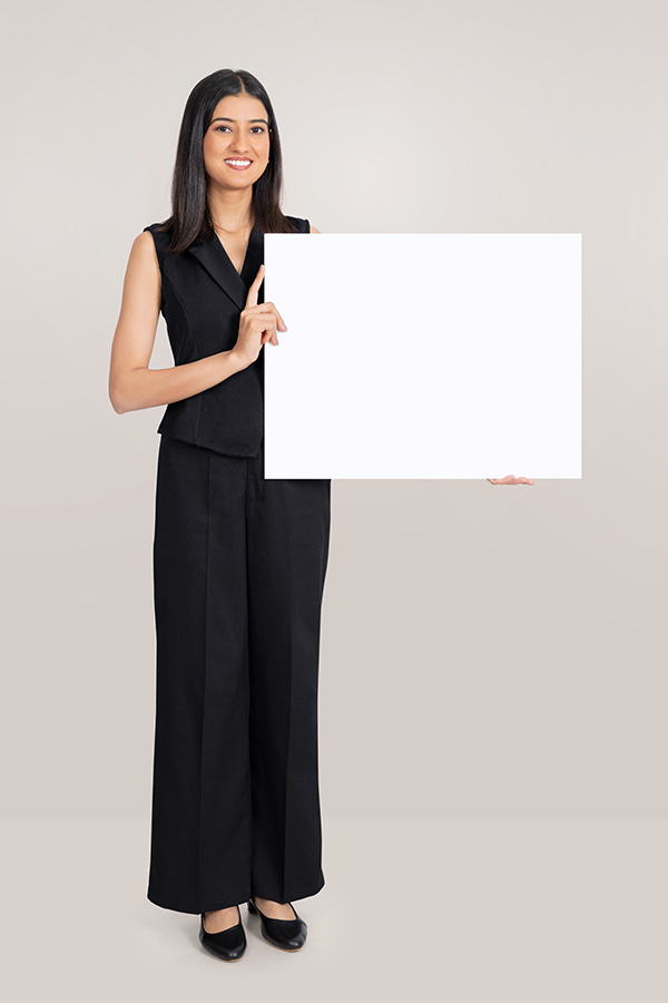 Indian businesswoman holding blank signboard for advertising message