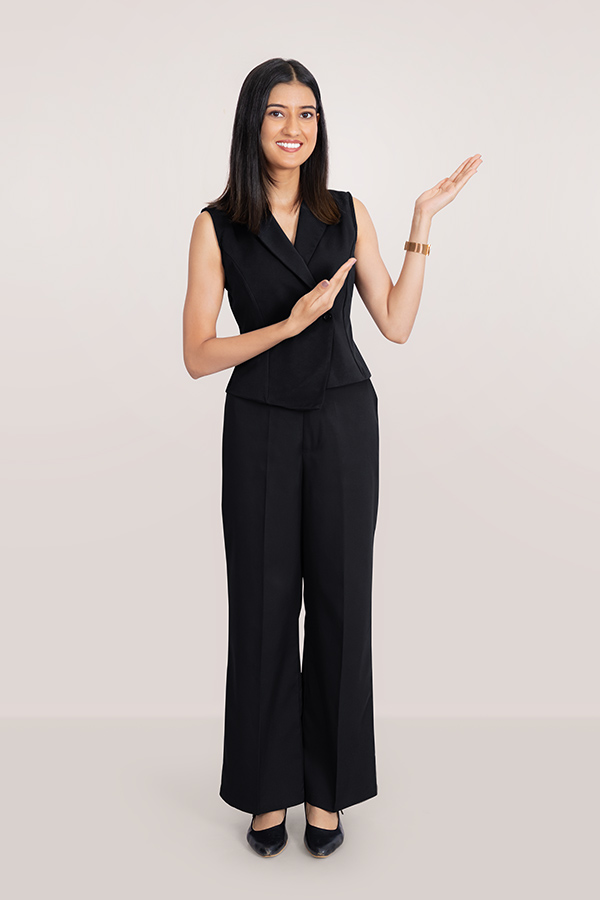 Indian businesswoman presenting with open palm gesture for corporate communication