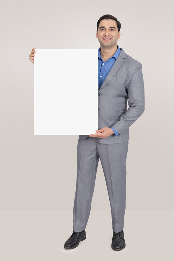 Indian businessman holding blank signboard for advertising and marketing message