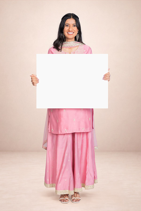 Indian woman presenting a blank white board for promotional messaging